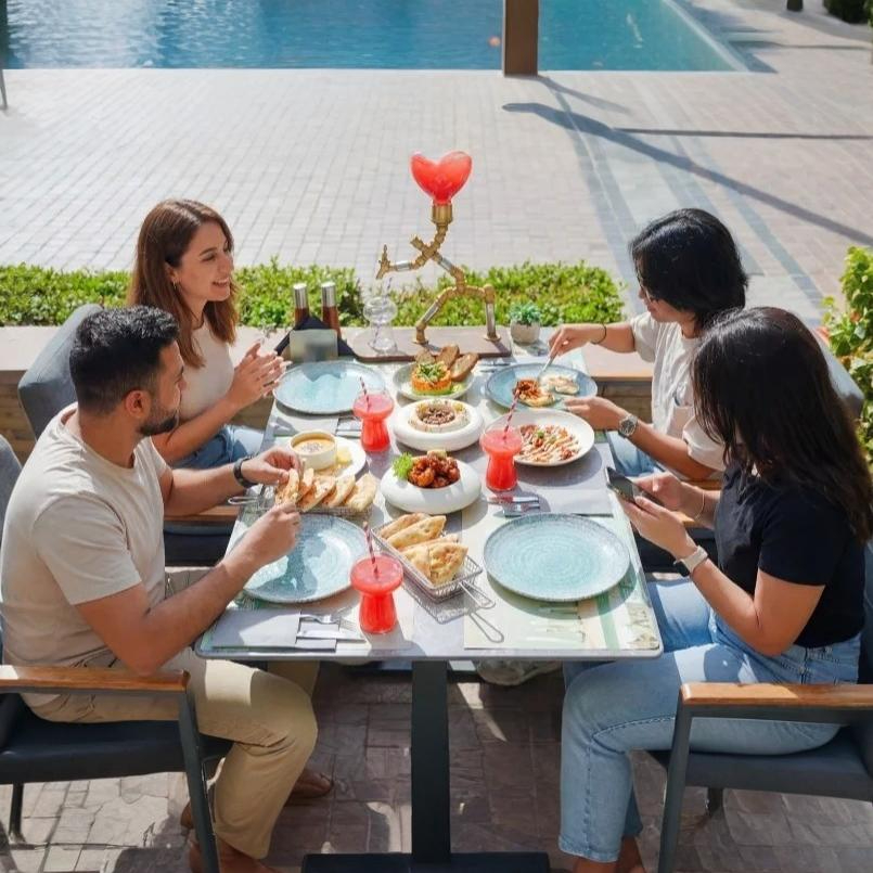 people having lunch at Jasmira